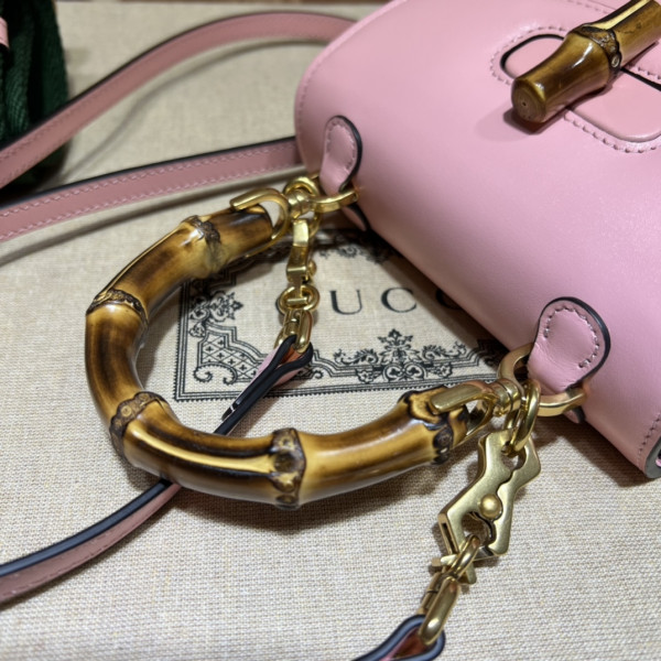 G*u*i mini top handle bag with bamboo