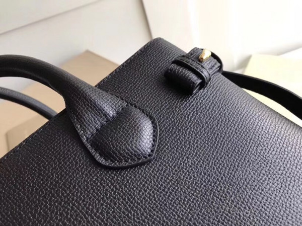 B**rry the medium banner in leather and house check