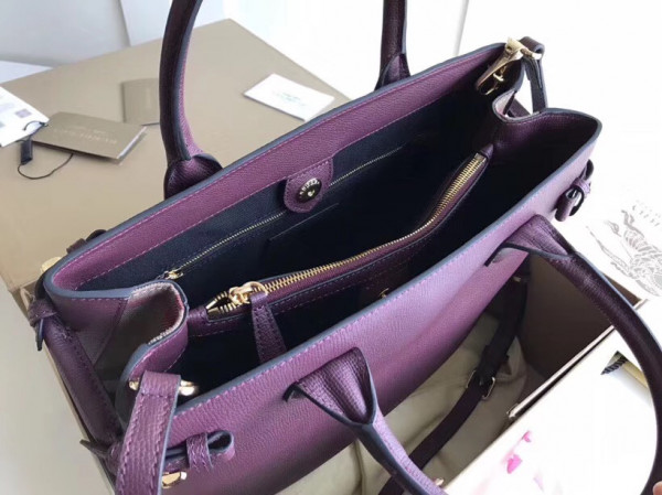 B**rry the medium banner in leather and house check