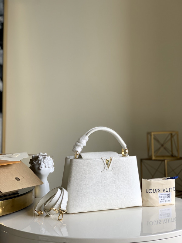 l**is V*t*n capucines pm