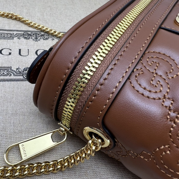 G*u*i gg matelassé top handle mini bag